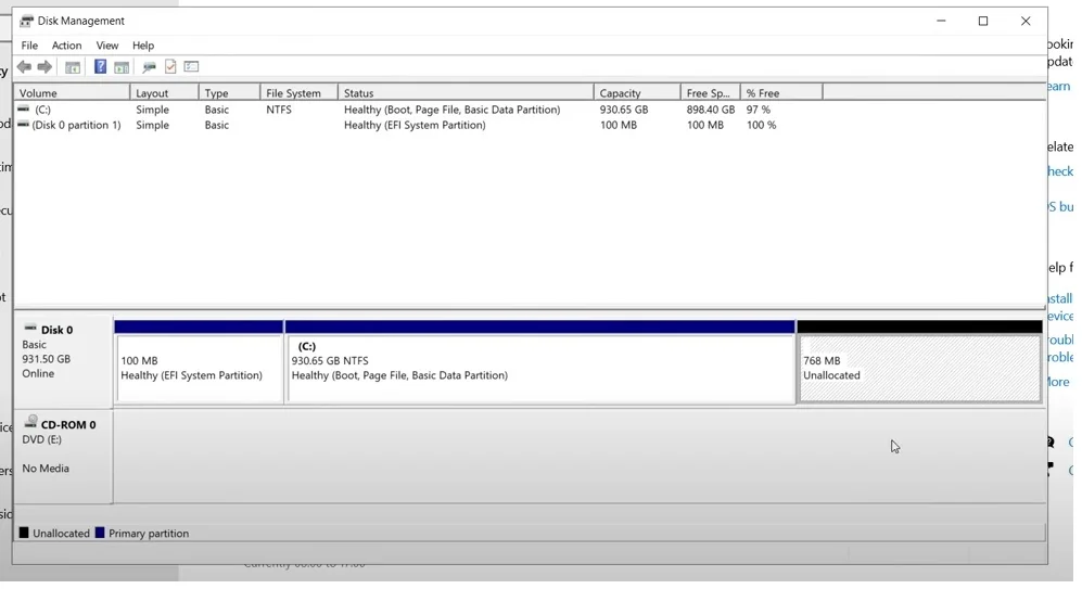 Disk Management showing the combined unallocated space